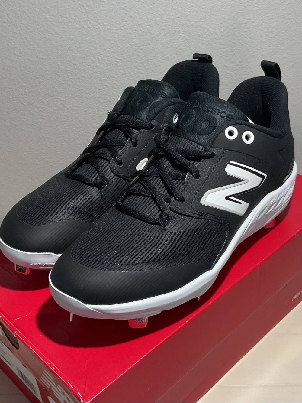 New Balance Black & White Metal Baseball Cleats